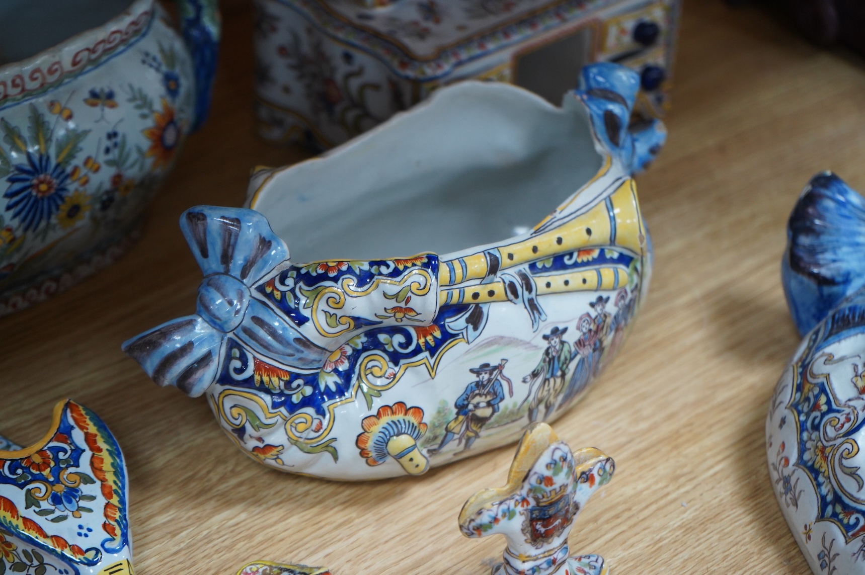 19th century French decorative faience including bag pipes, a large wall pocket, jardiniere etc (22).